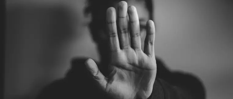 Bild på hand som symboliserar stopp